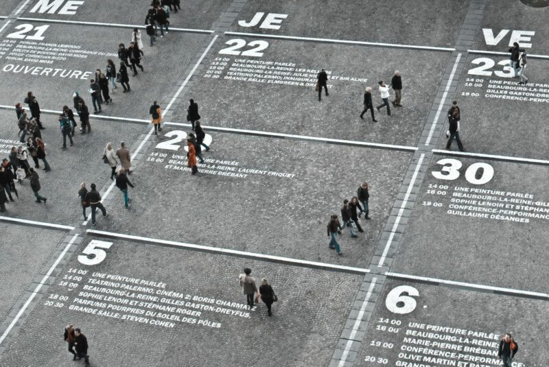 People walking over numbers